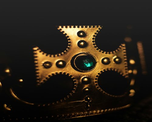Smartphone one showing a fictional CROWN mobile game