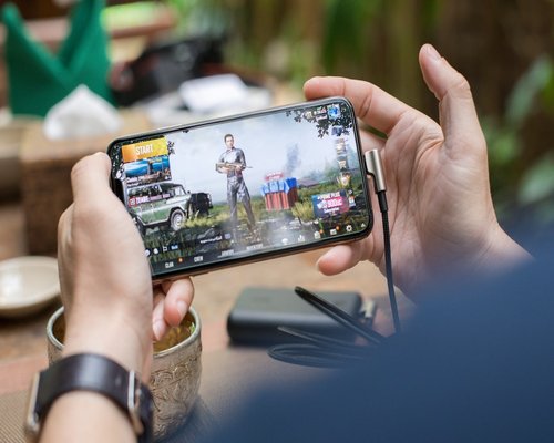 Smartphone two showing a community gaming interface